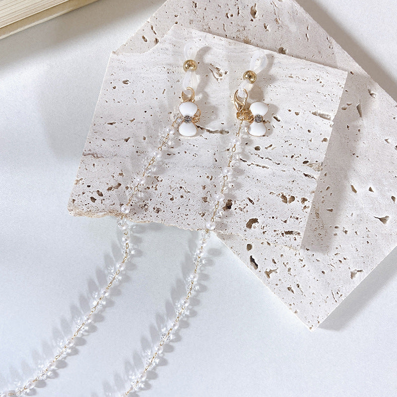 Elegant earrings with pearls and flower pendants Kalsten