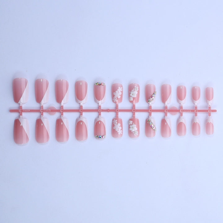 Artificial nail set with flower and glitter details Kalsten