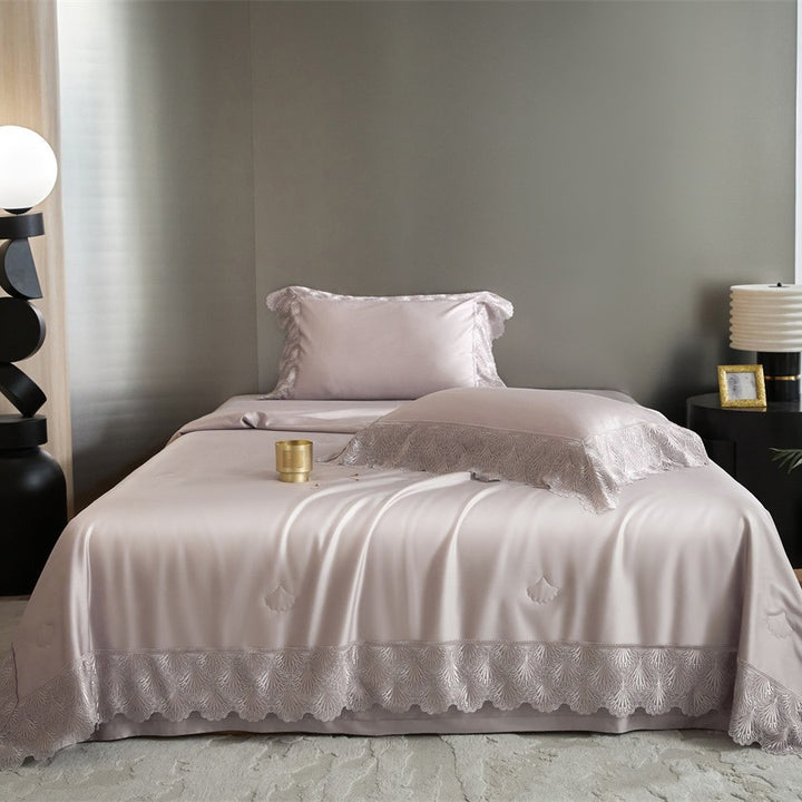 Luxurious satin bed linen set with French lace trim