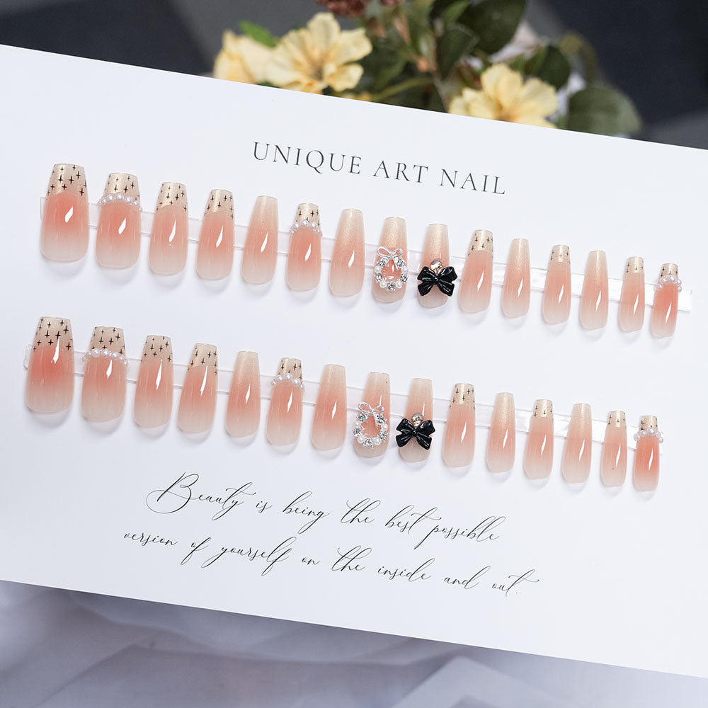 Decorative Press-On Nails with Bow and Rhinestone Accents