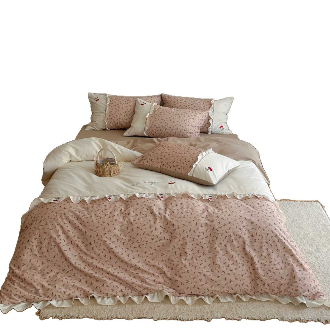 Bedding set in cottage style with cherry embroidery, ruffle and micro print