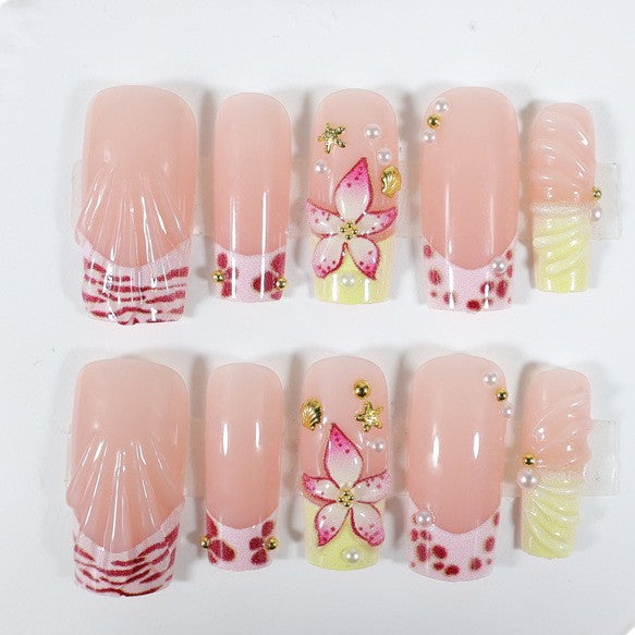 Nail art set with floral accents and glitter decorations Kalsten