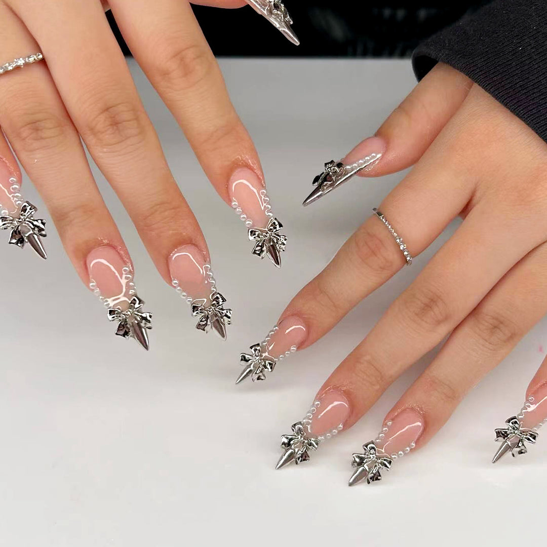 Glamorous artificial nails with decorative accents Kalsten