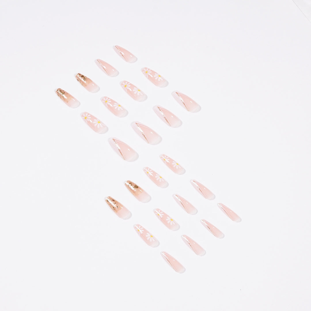 Artful nail extensions with floral designs and glitter accents Kalsten
