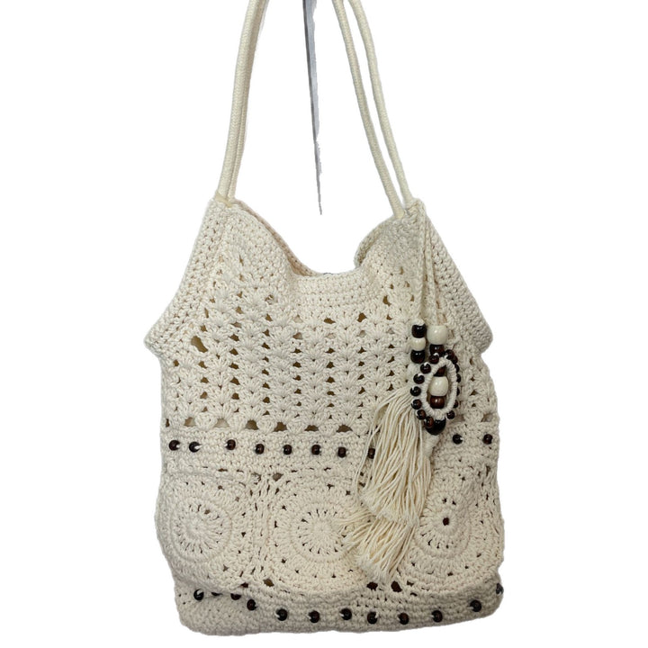 Hand-crocheted shoulder bag with unique fringe design Kalsten