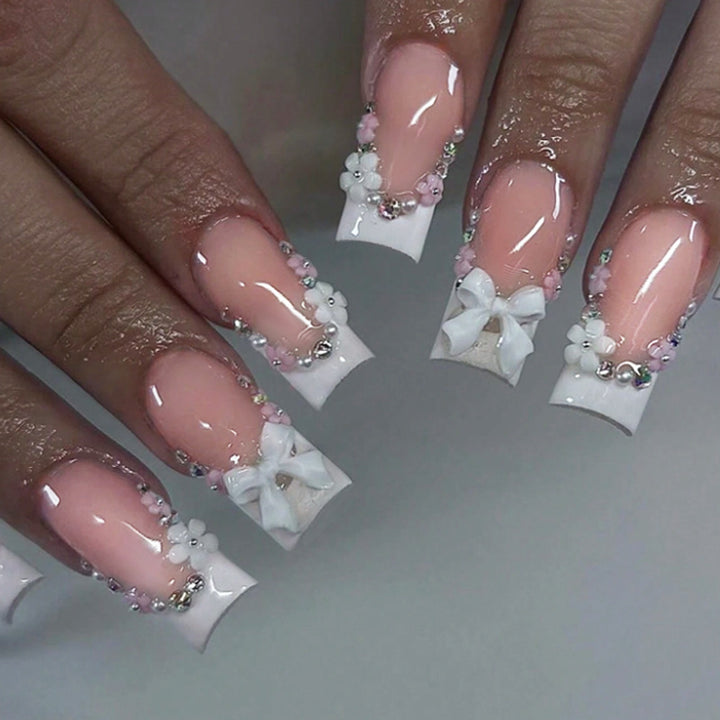 Acrylic Nail Set with Elegant Bows and Glitter Accents Kalsten