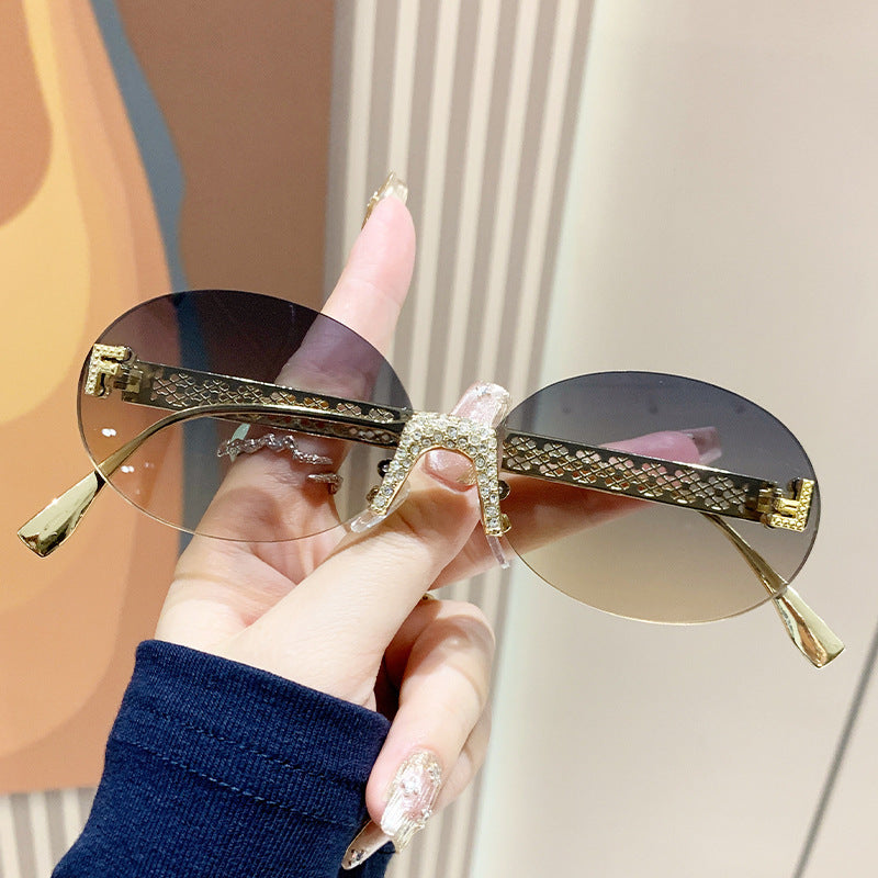 Women's sunglasses with glittering frame and oval lenses Kalsten