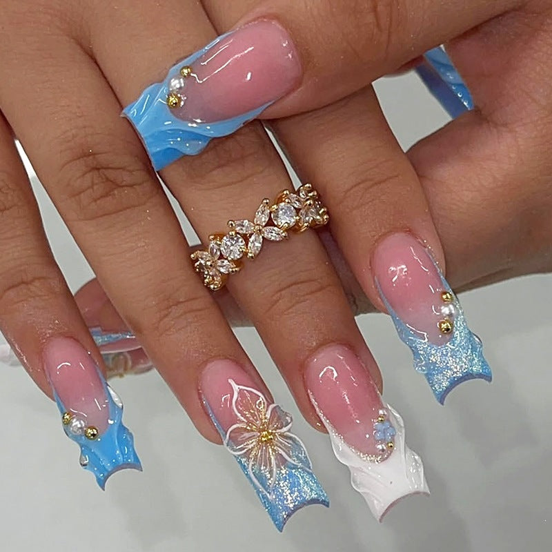 Nail set with elegant floral accents and glitter Kalsten