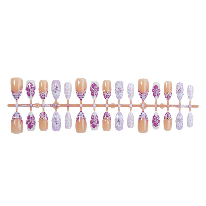 Artificial nail set with elegant flower designs and glitter accents Kalsten