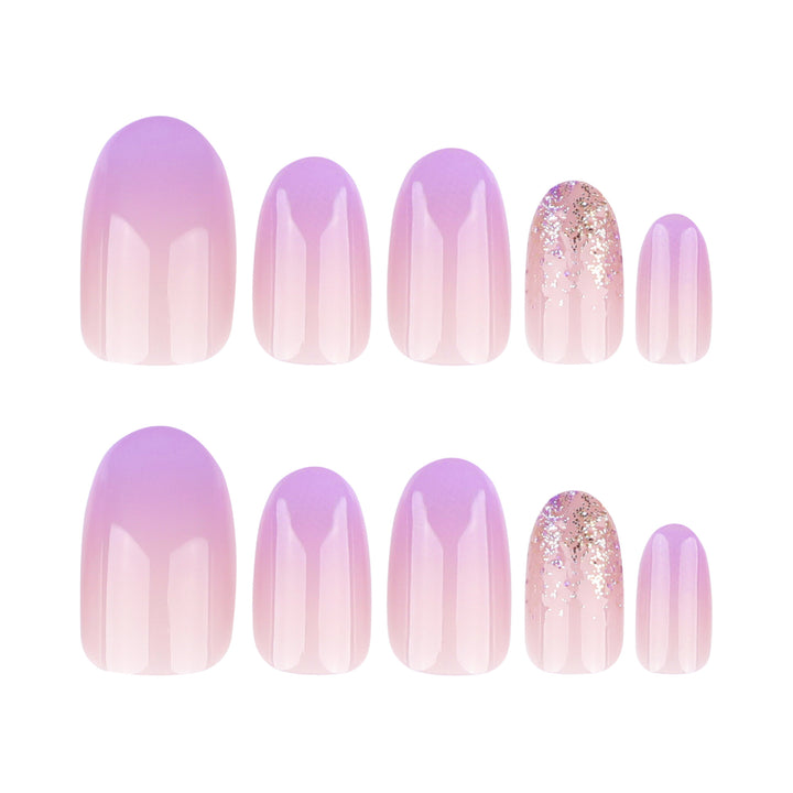 Artful nail art with ombre design and glitter accents Kalsten