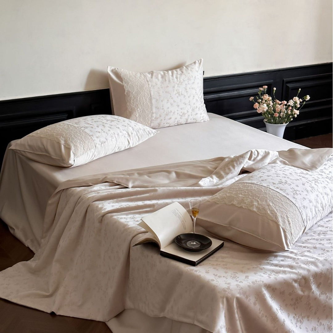 Luxurious satin bedding set with lace appliqué and jacquard pattern