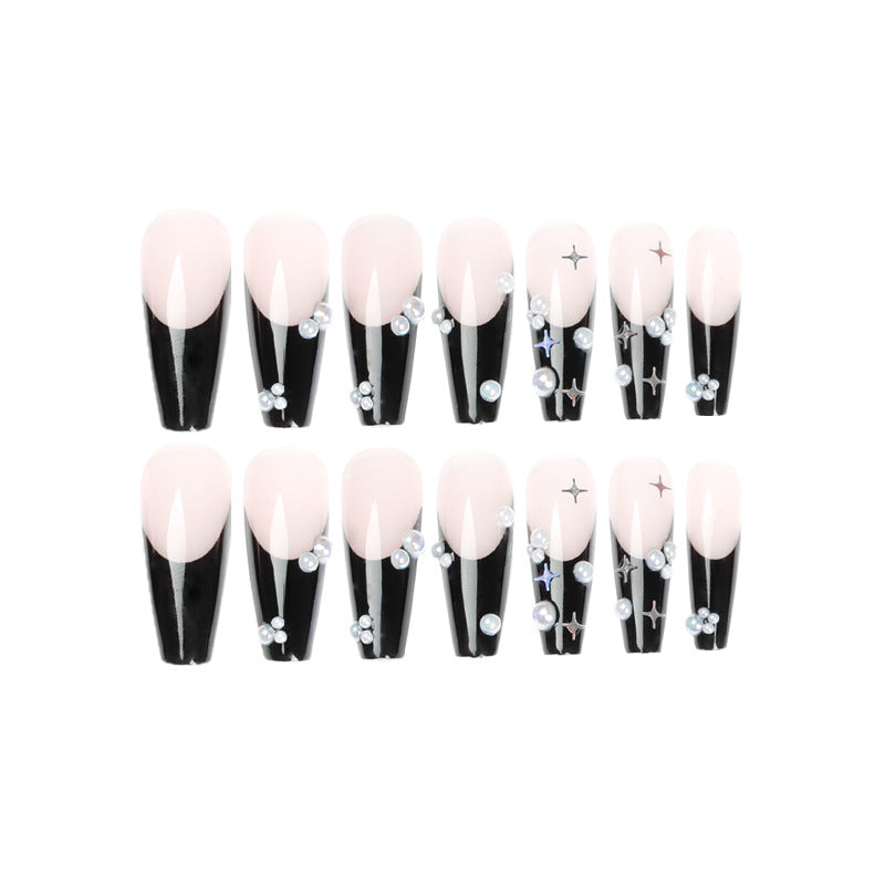 Artificial nail art with pearl and shine elements Kalsten