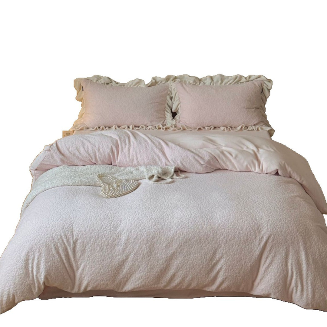 Bedding set with ruffle border and textured cotton blend