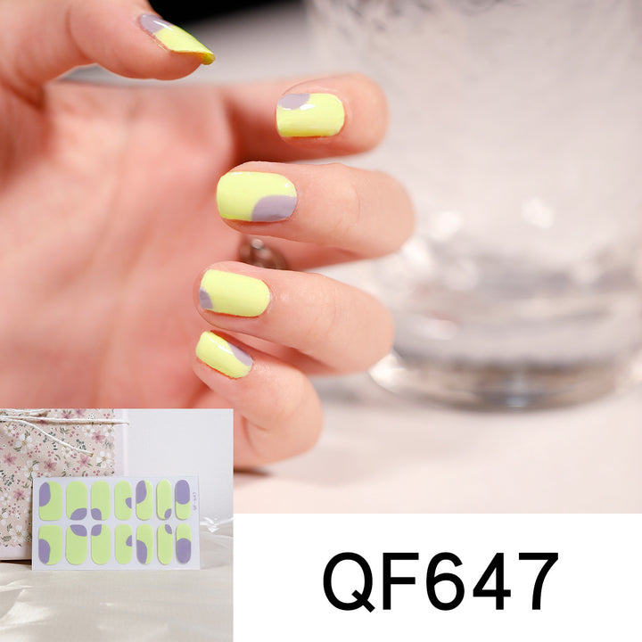 Artificial nail art with heart-shaped designs and soft color gradients Kalsten