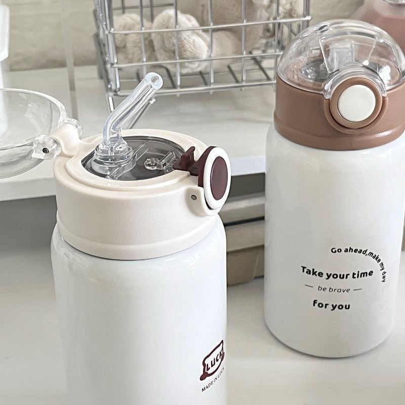 Women's insulated drinking bottle with innovative flip lid and practical handle Kalsten