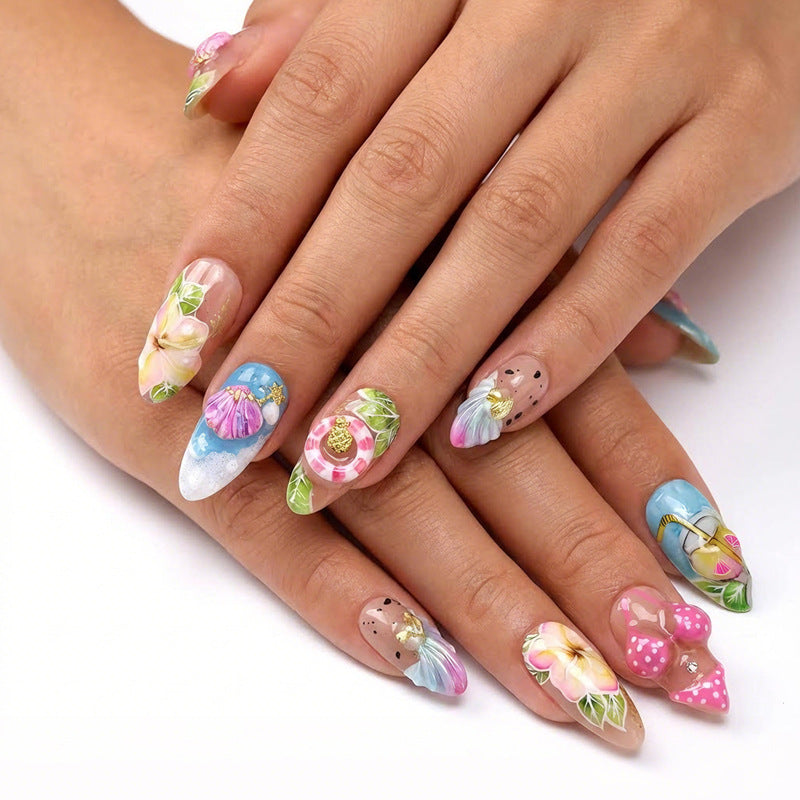 Artificial nail set with botanical designs and glamorous accents Kalsten