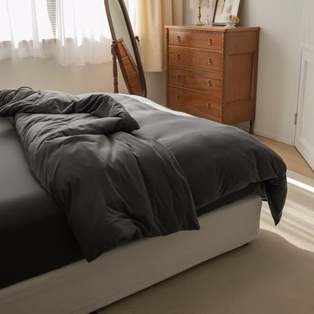 Minimalistic duvet cover set made of skin-friendly cotton blend with soft fiber filling