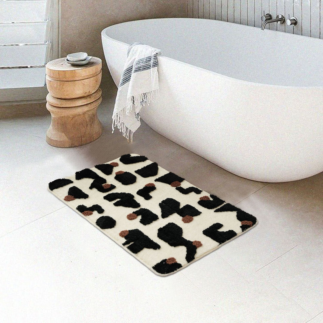 Tufted bathroom mat in abstract leopard pattern with soft high pile Kalsten