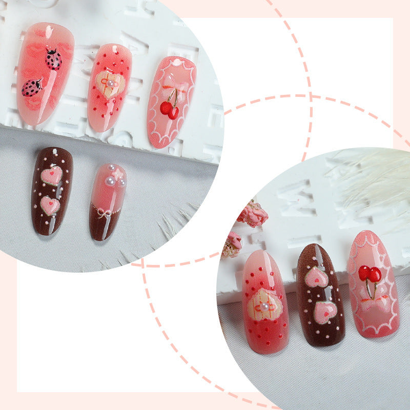Artificial nail set with floral and playful tea motifs Kalsten
