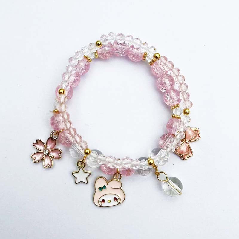Elegant bracelet with animal and glitter pendants Kalsten