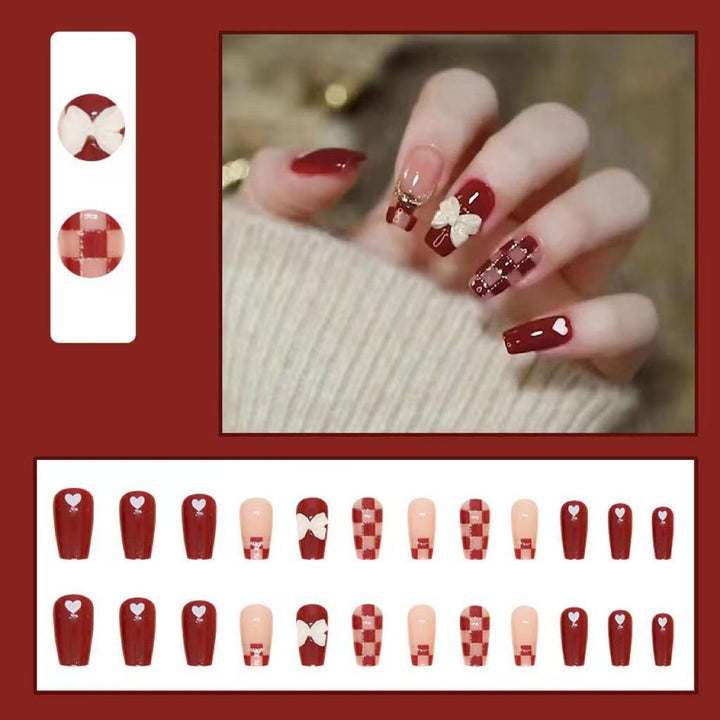 Artificial nails with decorative heart and bow details Kalsten