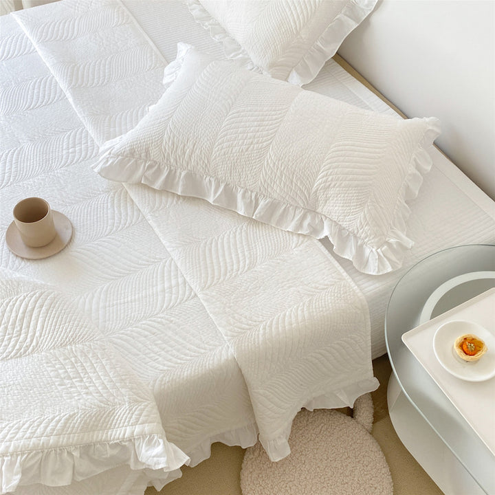 Quilted bedspread set with ruffle and embossed leaf quilting