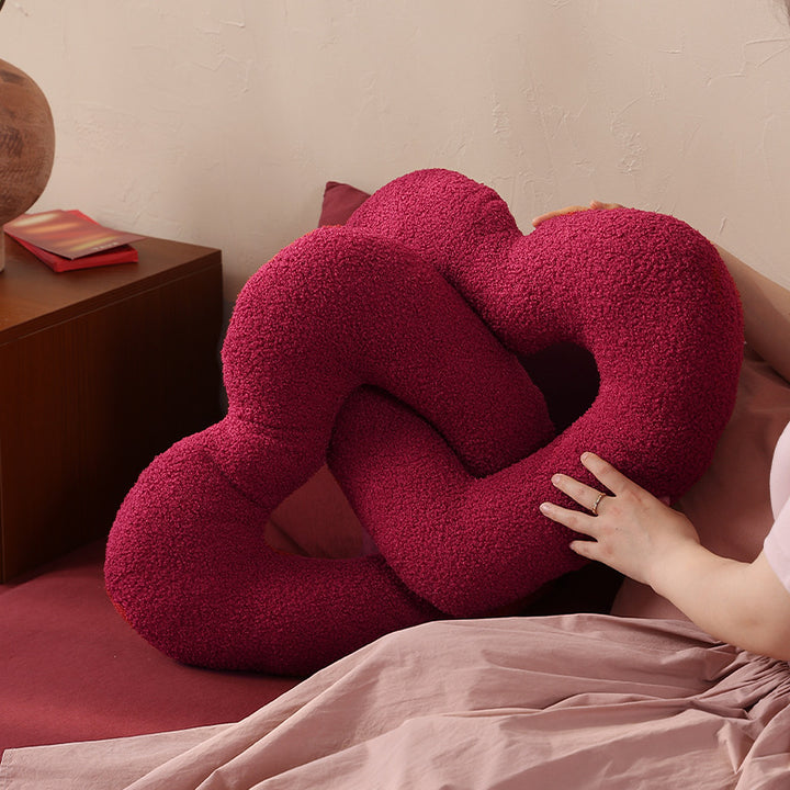 Braided heart cuddle pillow duo with bouclé cover and flexible filling