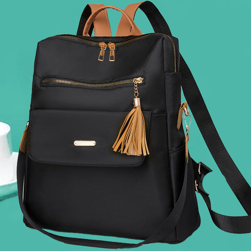 Multi-Functional Backpack with Decorative Tassel Kalsten