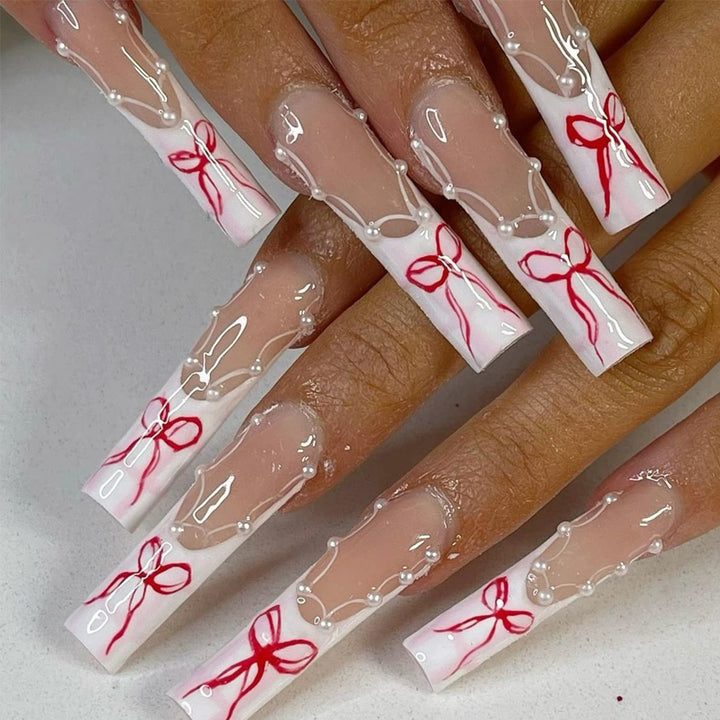 Decorative Press-On Nail Art with Ribbon Accents Kalsten