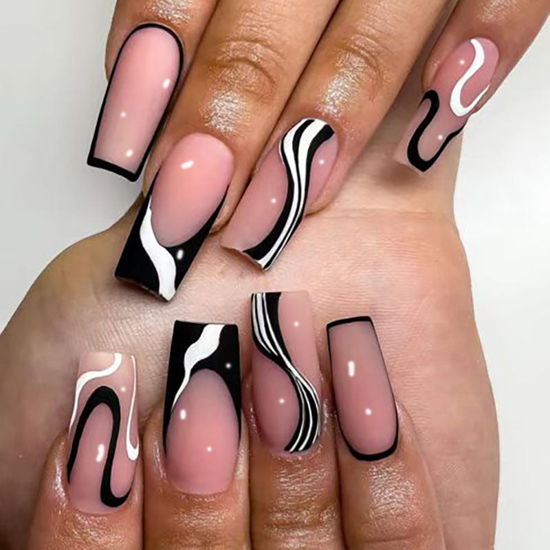 Artistic Long Press-On Nails with Unique Swirl Design