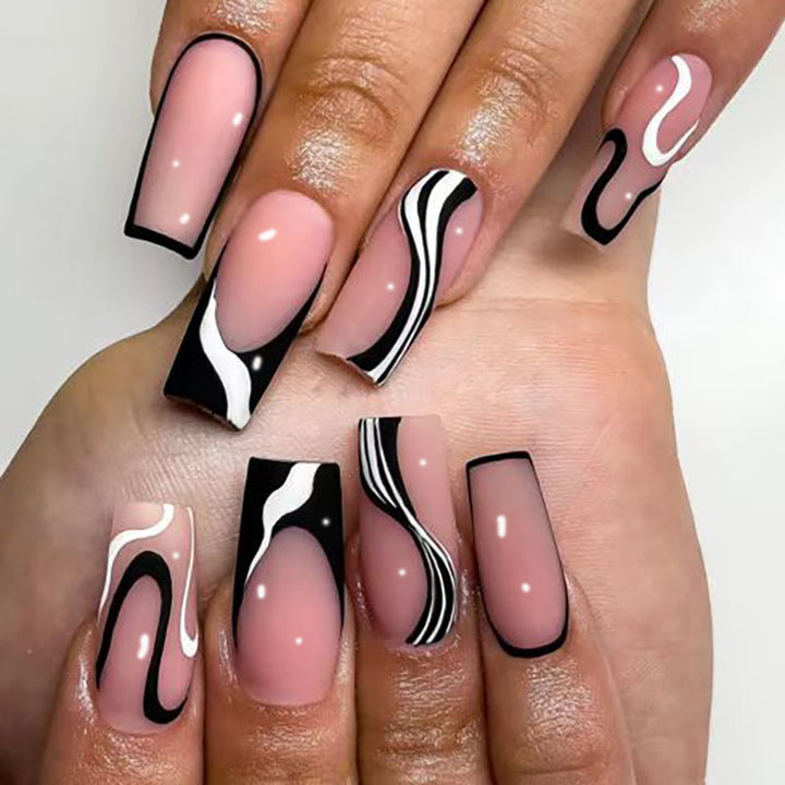 Artistic Long Press-On Nails with Unique Swirl Design