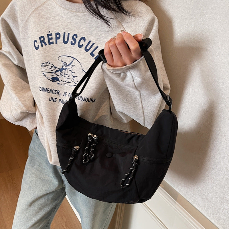 Practical shoulder bag with external zip pockets Kalsten