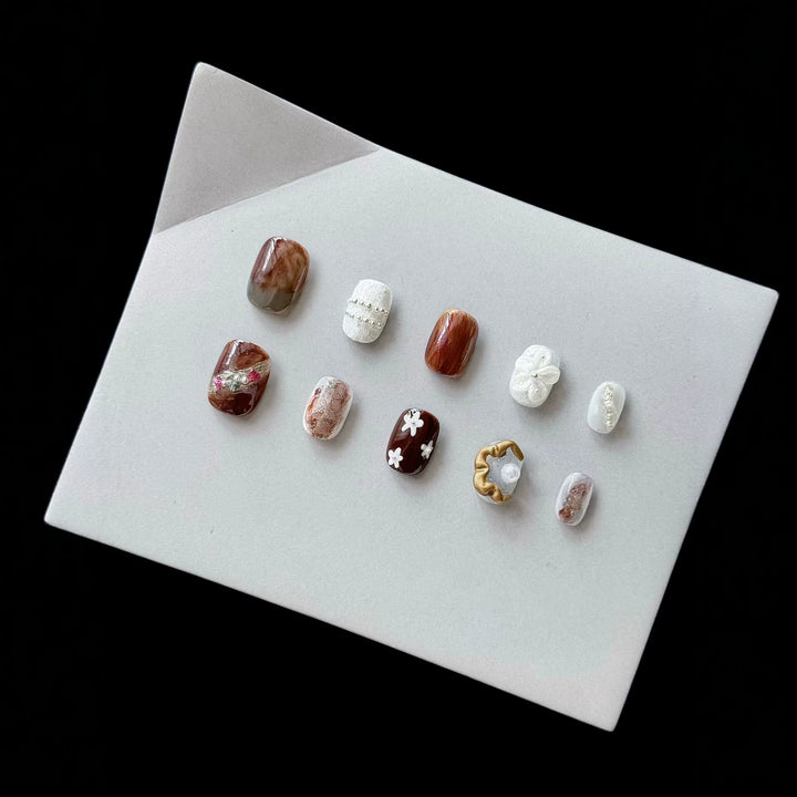Artistic Press-On Nail Set with Unique Textures and Designs