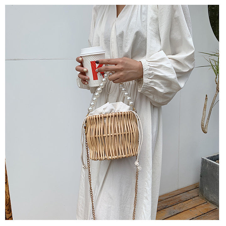 Women’s handbag with elegant pearl handle and braided design Kalsten