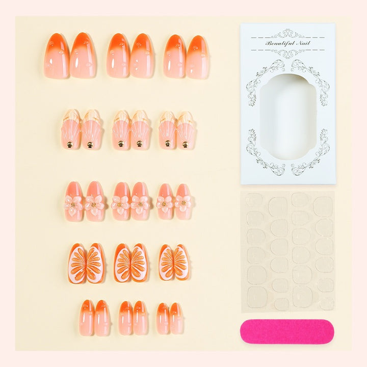 Artificial nail set with floral designs and glitter accents Kalsten