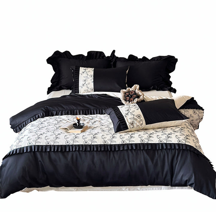 Luxurious cotton satin bedding set with ruffles and delicate floral embroidery