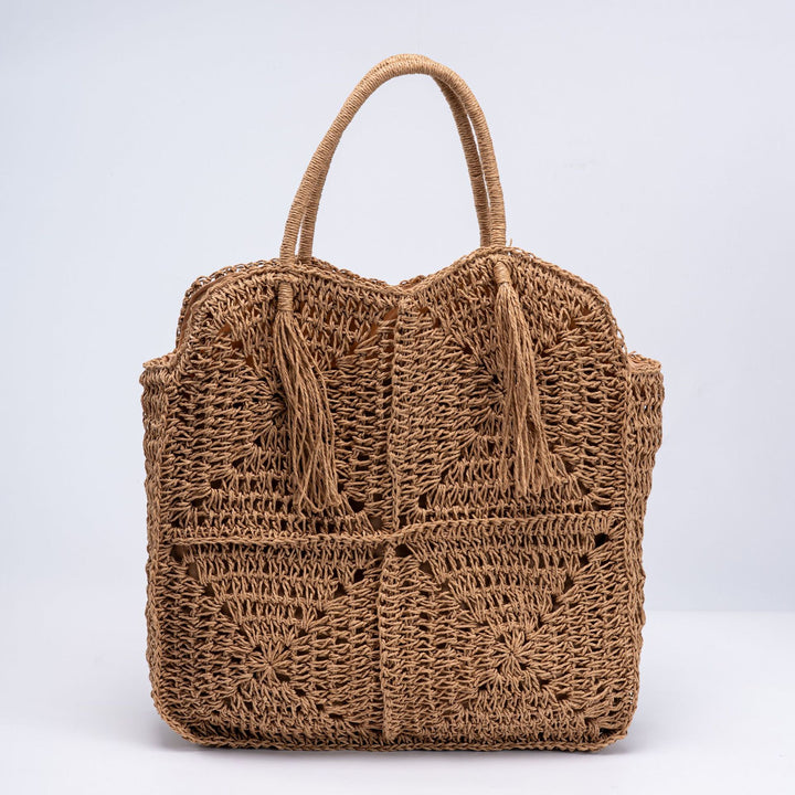 Handcrafted straw beach bag with decorative fringes Kalsten