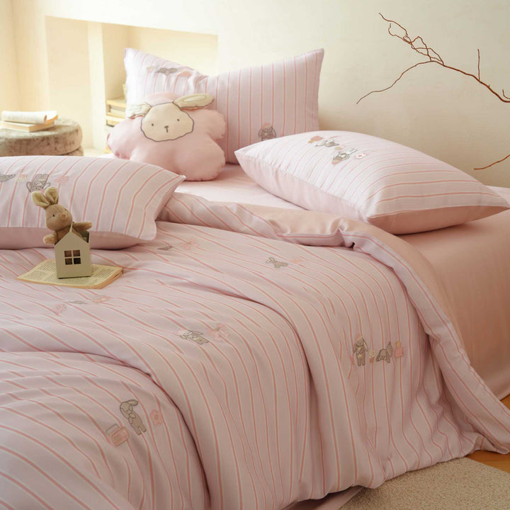 Children's bedding set made of high-quality cotton satin with fine stripes and applied bunny motifs
