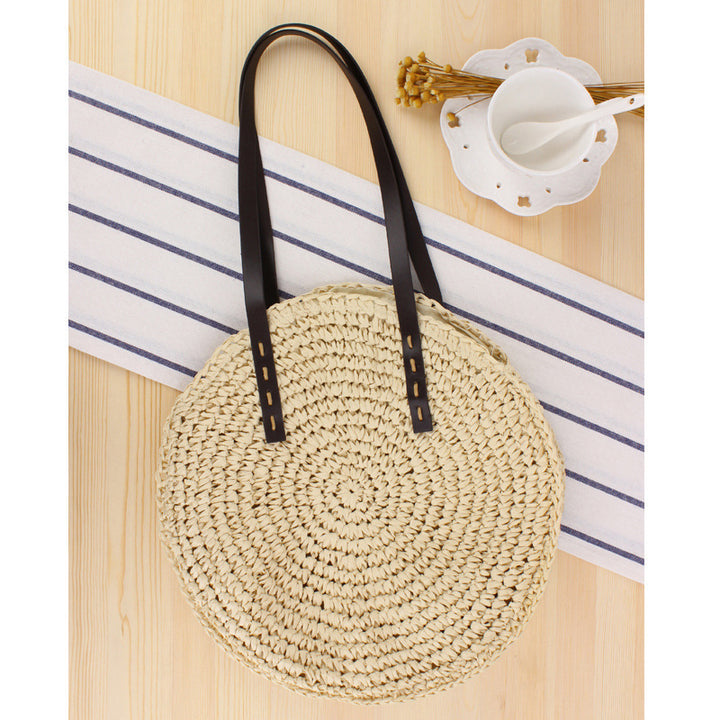 Round basket bag with sturdy leather handles Kalsten
