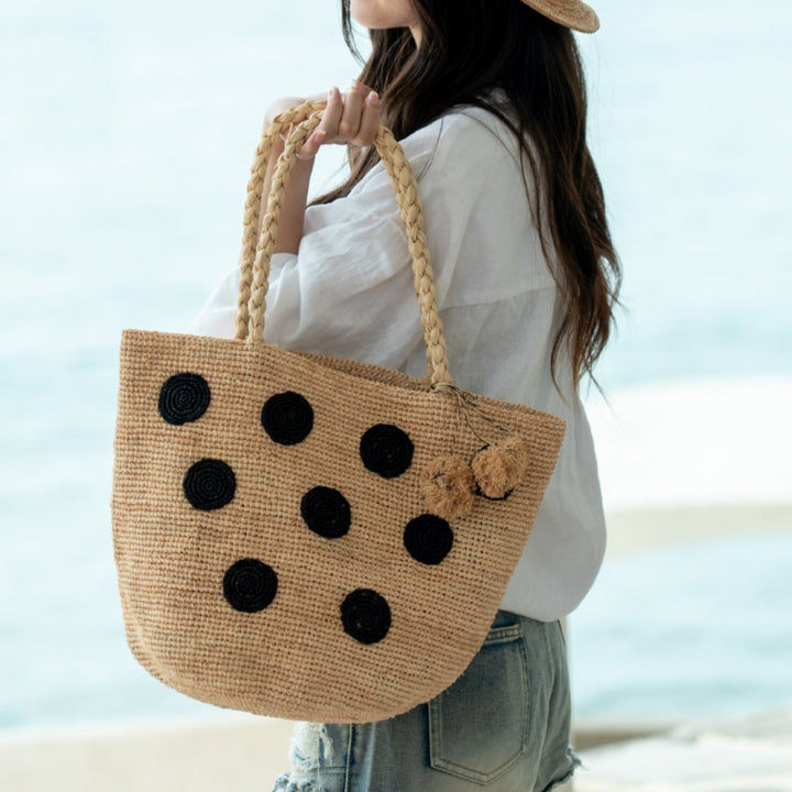 Handcrafted straw bag with eye-catching accents Kalsten