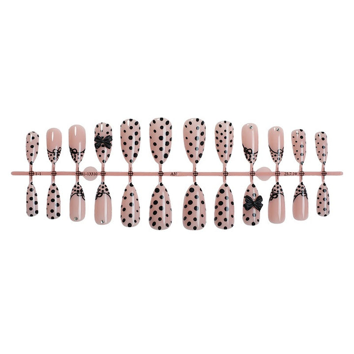 Nail art set with elegant polka dot and bow motifs Kalsten