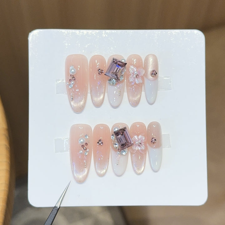 Artificial nails with elegant jewelry details Kalsten