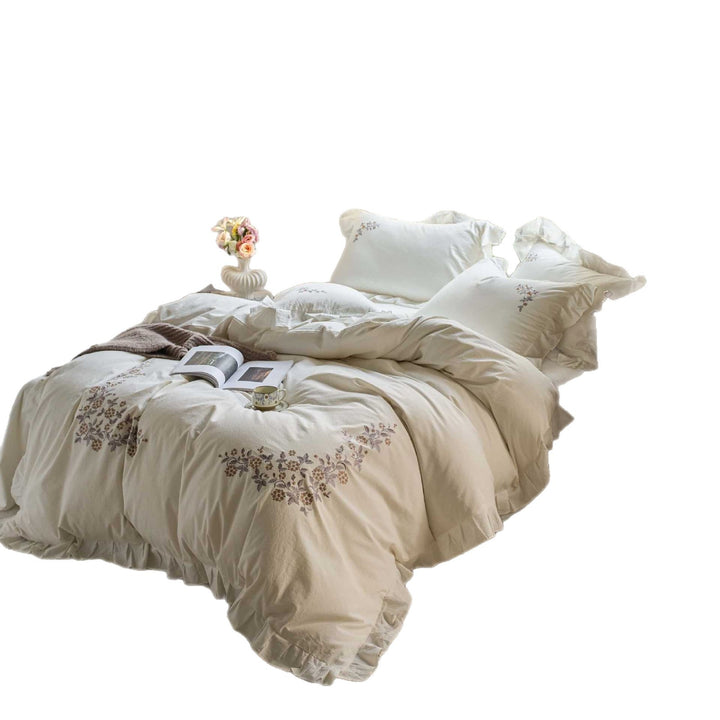 Romantic cotton percale bedding set with floral embroidery and ruffle