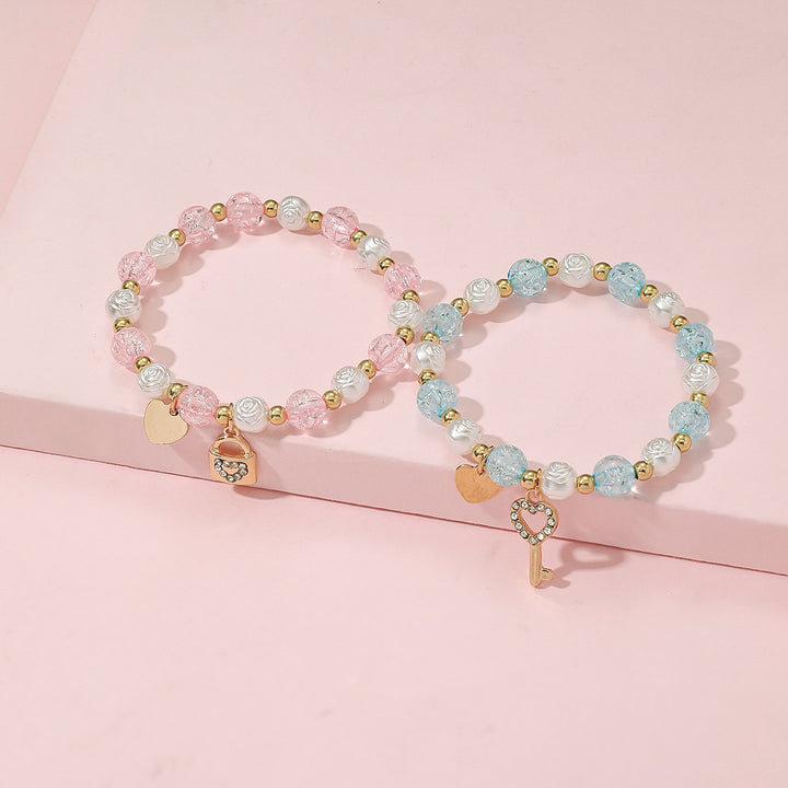 Playful bracelet set with heart and key design Kalsten