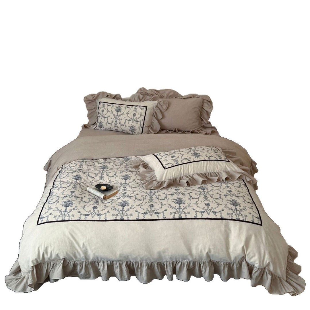 Romantic linen-look bedding set with ruffle, quilted center panel, and fine floral jacquard