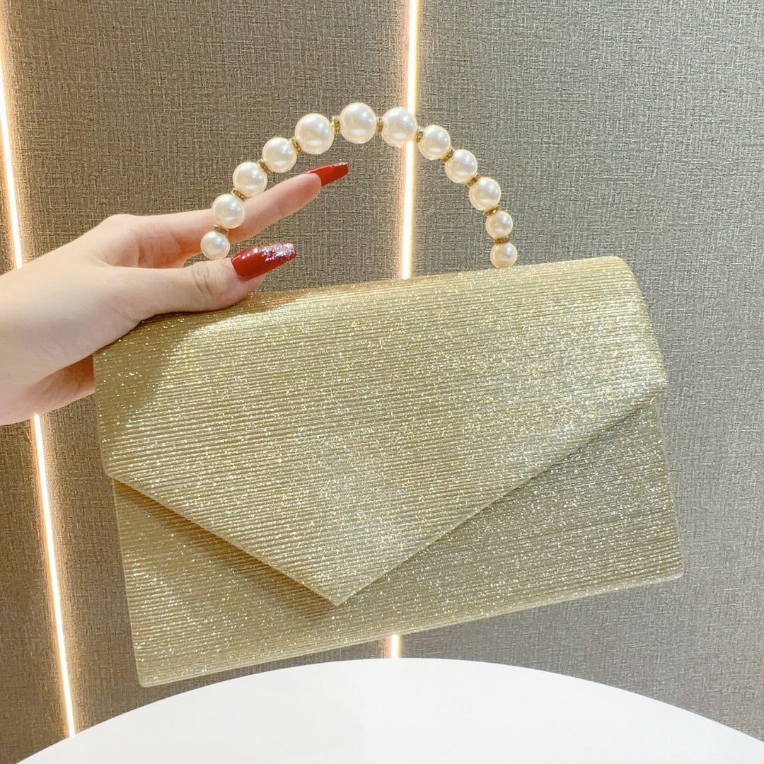 Elegant Pearl-Handled Evening Clutch