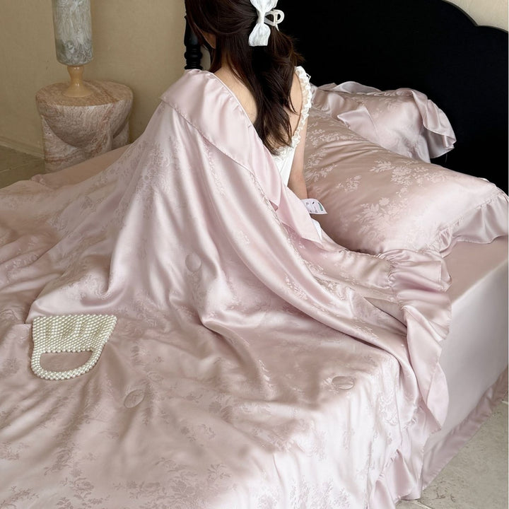 Luxury satin bed set with jacquard relief and ruffled edges