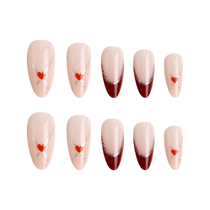 Acrylic nails with heart motifs and glitter details Kalsten