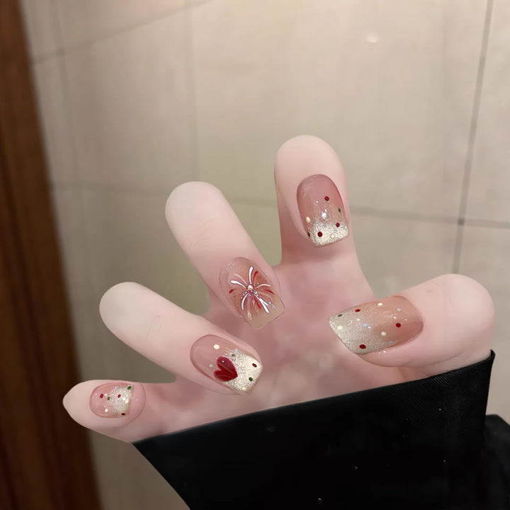 Artistic Press-On Nail Art Set with Floral and Glitter Accents