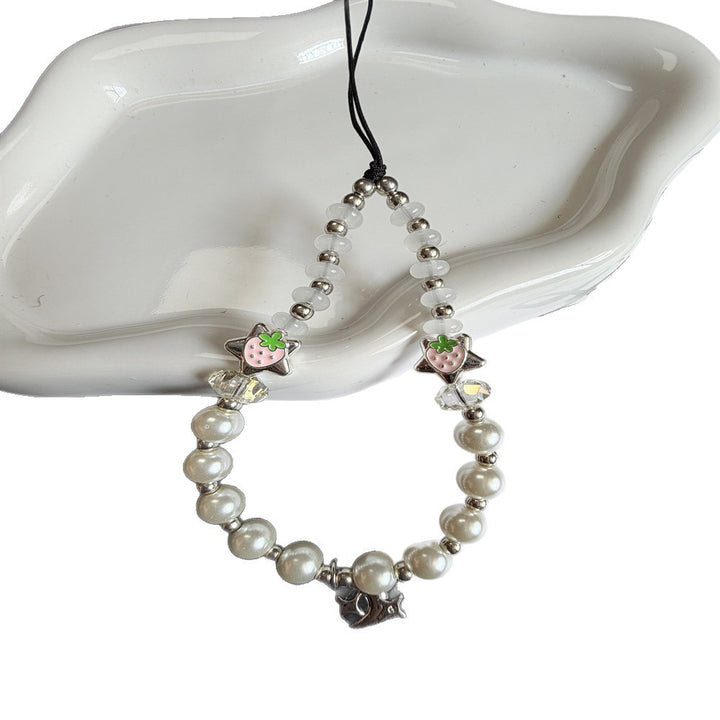 Playful Pearl and Charm Exaggerated Necklace Kalsten
